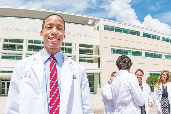 Student outside of the Schmidt College of Medicine